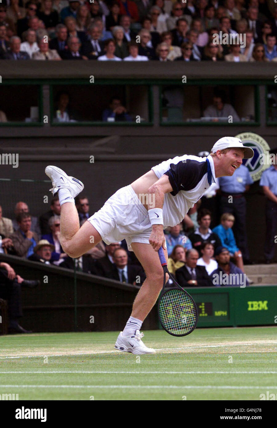 No Commercial Use: American Jim Courier in action during his match against Tim Henman at Wimbledon. Henman defeated Courier 4-6 7-5 7-5 6-7 9-7. Stock Photo