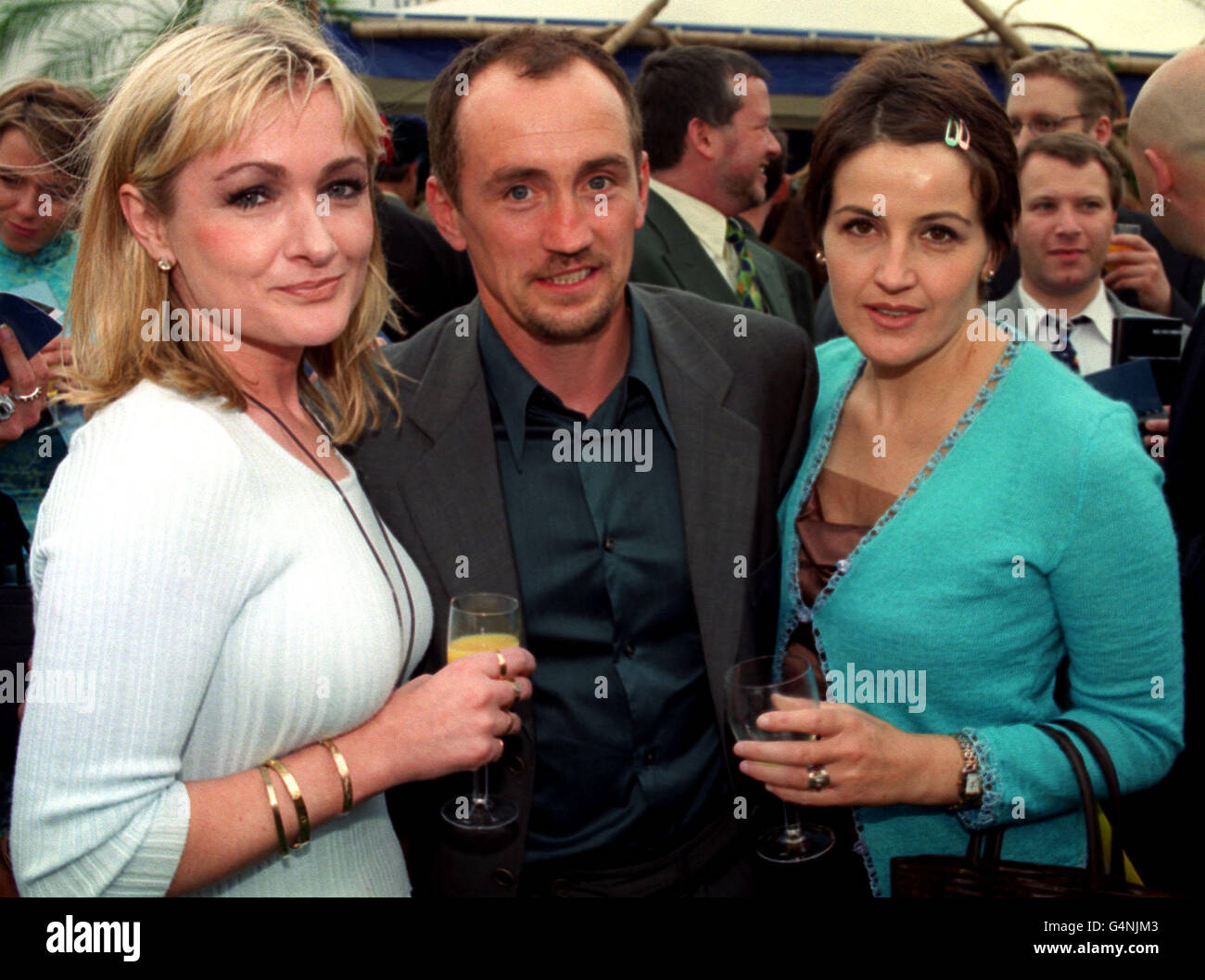 L-R: Comic actress Caroline Aherne with former boxing champion Barry McGuigan and his wife Sandra, at the '18' Creative Freedom Awards held at Planit 2000 in London. Aherne won an award for Television Entertainment, for 'The Royle Family'. Stock Photo