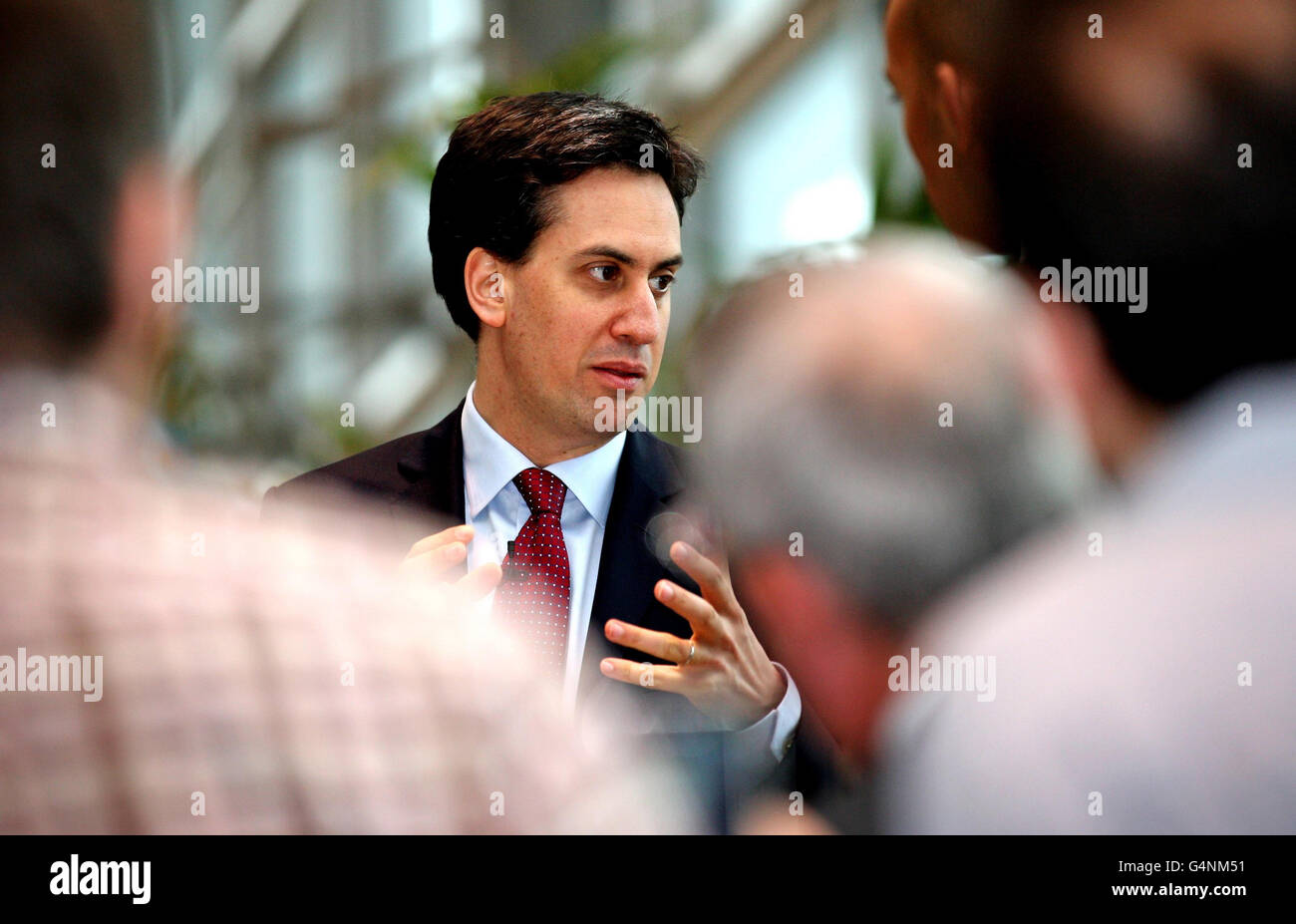 Labour Party leader Ed Miliband takes questions during a visit to TTP group in Melbourn, Cambridgeshire. Stock Photo