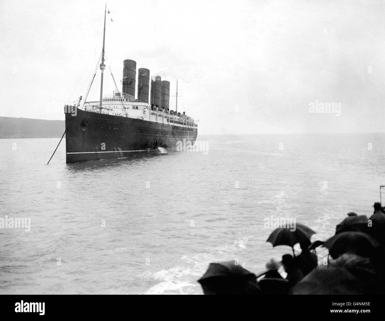 The Transatlantic Liner RMS Lusitania moored in the Mersey, Christmas 1911. The 'Lusitania' was torpedoed by the German U-Boat U-20 12 miles off the Old Head of Kinsale, Ireland, on the 7th May 1915. The loss of life among American passengers is thought to have had a direct influence on the decision by the United States to enter the First World War on the Allied side. Stock Photo