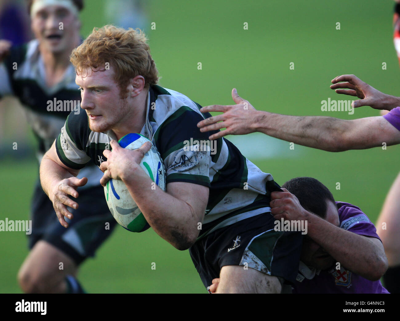 Action in a friendly fixture between Edinburgh University and Durham University at Peffermill, Edinburgh. Stock Photo