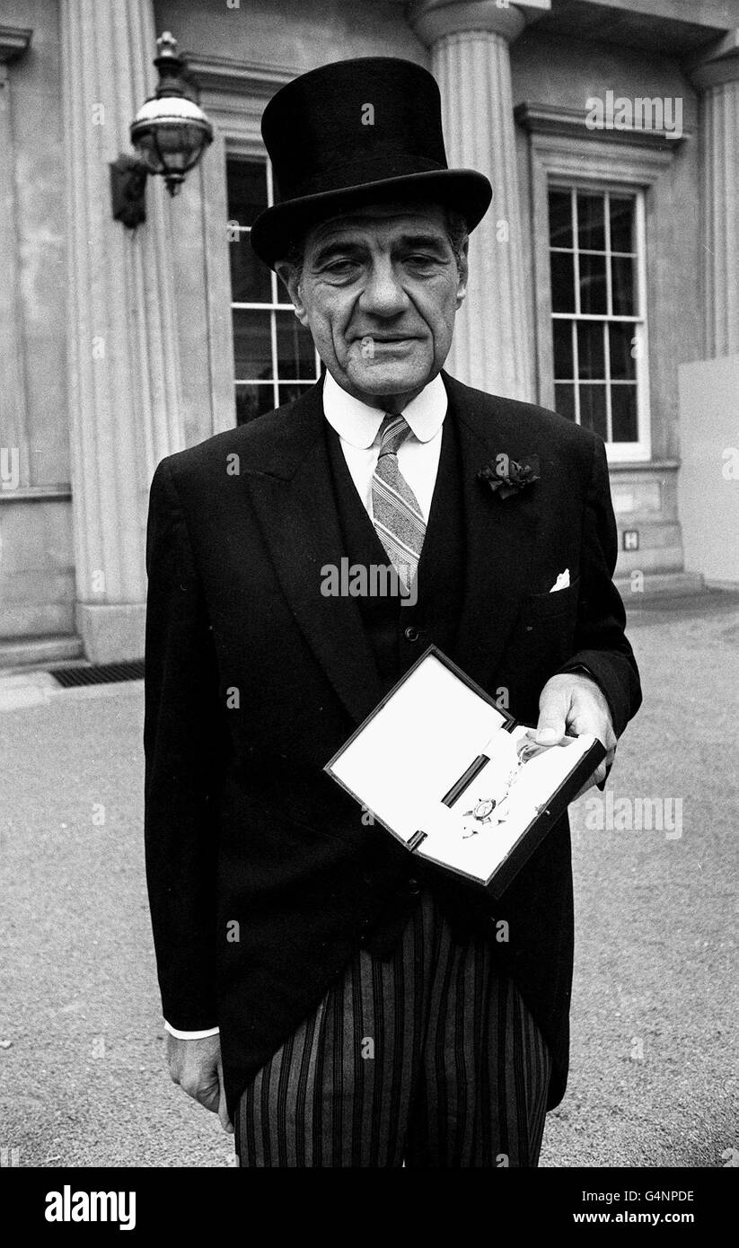 Arthur Katz, president of the British Toy Manufacturers Association at Buckingham Palace, after an Investiture ceremony where he received the Commander Order of the British Empire (CBE) from the Queen Mother, presented to him on behalf of the Queen. Stock Photo