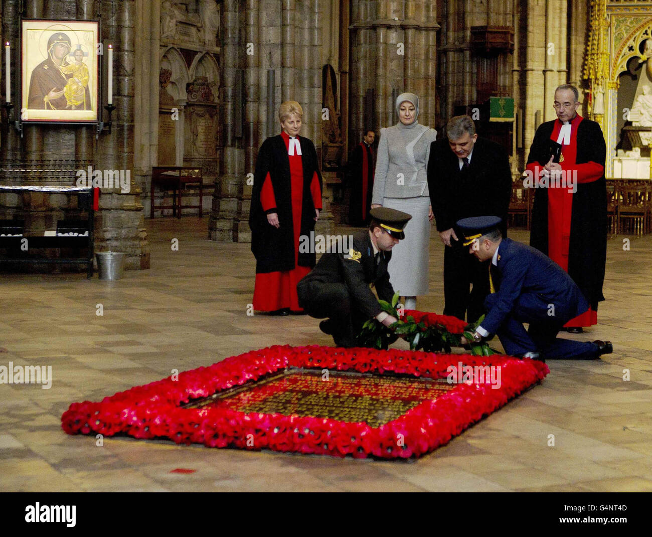 The President of Turkey Abdullah Gul, accompanied by his wife Hayrunnisa, lays a wreath at the Grave of the Unknown Warrior in Westminster Abbey in central London on the first day of his State Visit to the UK. Stock Photo