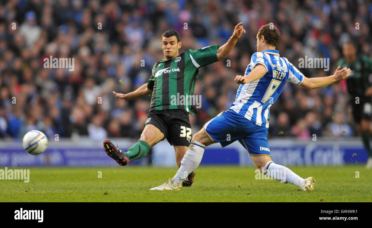 Brighton & Hove Albion's Ryan Harley and Coventry City's Conor Thomas (left) during the npower Football League Championship match at the AMEX Stadium, Brighton. Stock Photo