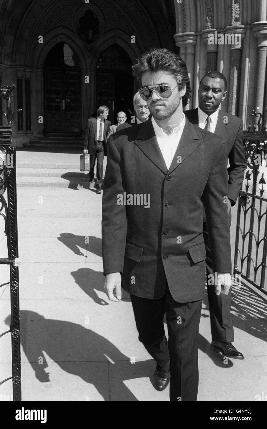 Pop superstar George Michael leaves the High Court after accepting a six figure undisclosed amount of libel damages from the Sun newspaper. The paper alleged he gatecrashed a party given by Andrew Lloyd Webber and was drunk and abusive. Stock Photo