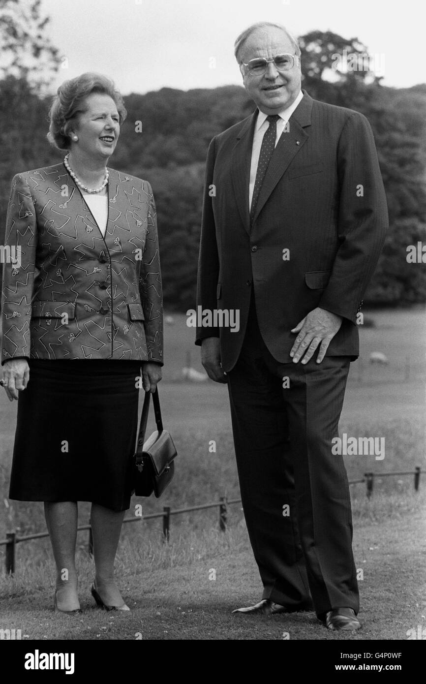 Margaret Thatcher and Chancellor Helmut Kohl of West Germany at ease in the grounds as they had three hours of 'relaxed and very friendly' talks at Chequers, the Prime Minister's country residence. They agreed more emphasis should be laid on the warmth of Anglo-German relations. Stock Photo