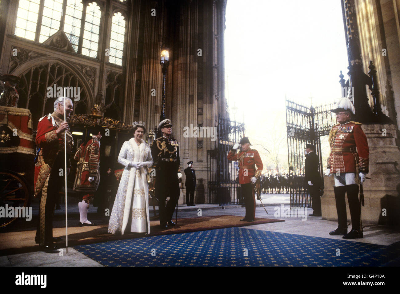 Queen Elizabeth II and the Duke of Edinburgh arrive at the Sovereign's Entrance to the Palace of Westminster during the State opening of Parliament. Stock Photo