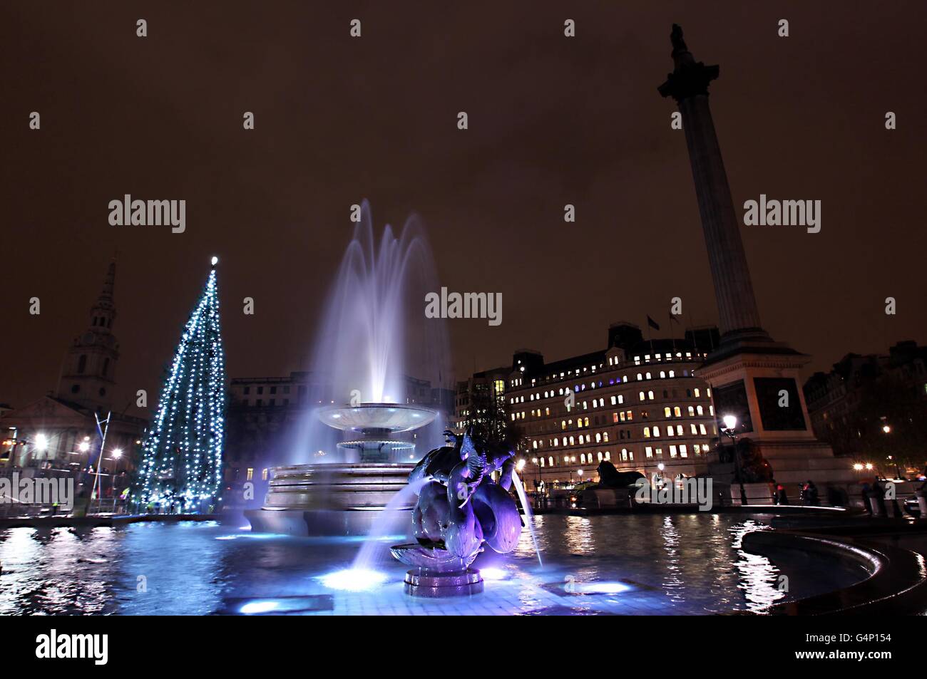 The Christmas tree in London's Trafalgar Square has its lights turned