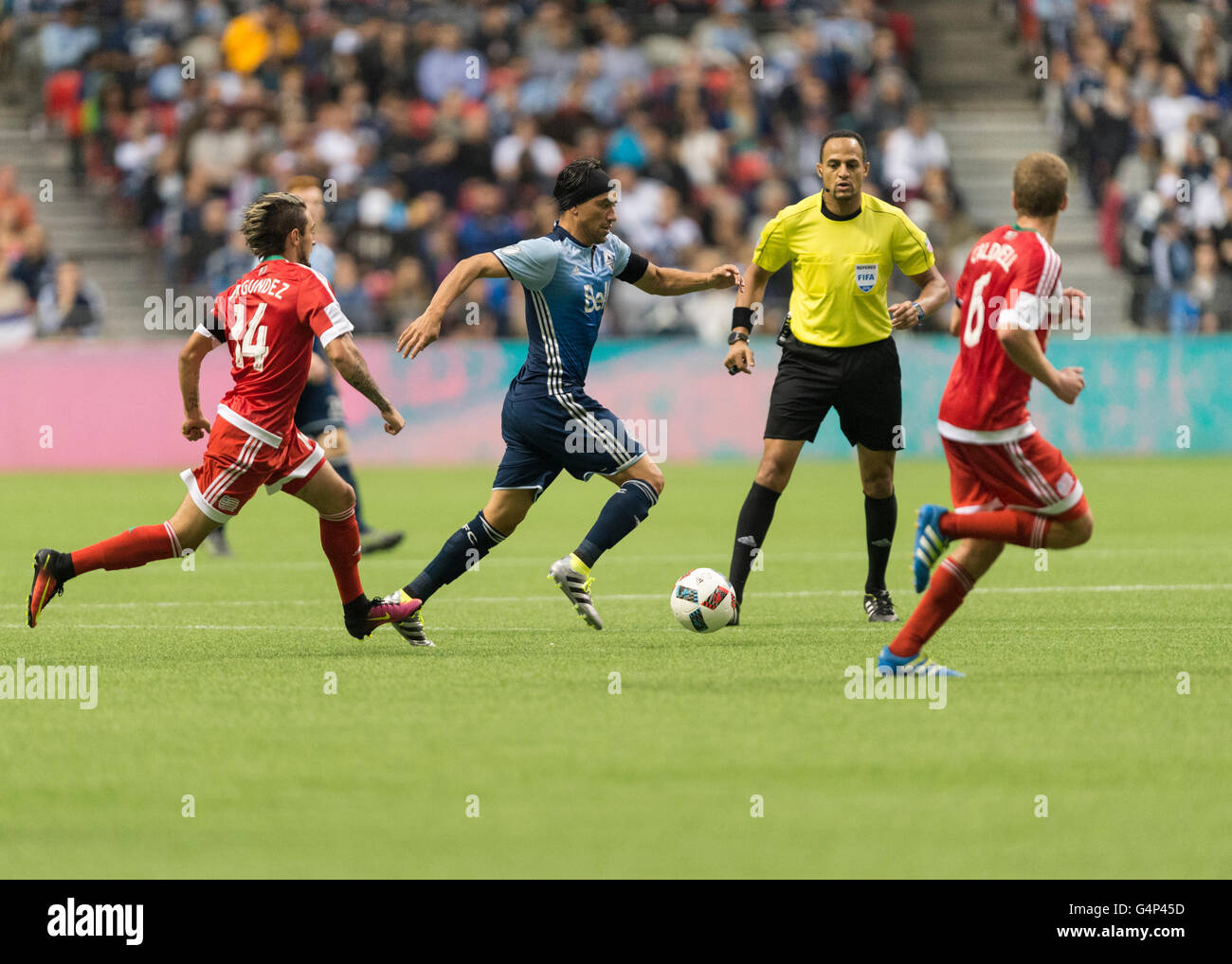 Vancouver, Canada. 18 June, 2016. Vancouver Whitecaps midfielder Christian Bolanos (7) with the ball. Vancouver Whitecaps vs New England Revolution, BC Place Stadium.  Final Score New England wins 2-1. Credit:  Gerry Rousseau/Alamy Live News Stock Photo
