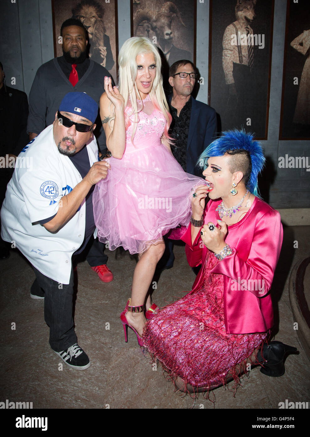 Los Angeles, California, USA. 17th June, 2016. Angelique 'Frenchy' Morgan (center) arrives to her music video release party with comedian Gil Fajardo (left) and artist/TV personality Sham Ibrahim (right) held at The Reserve cocktail club in Los Angeles, California, USA. Credit:  Sheri Determan / Alamy Live News Stock Photo