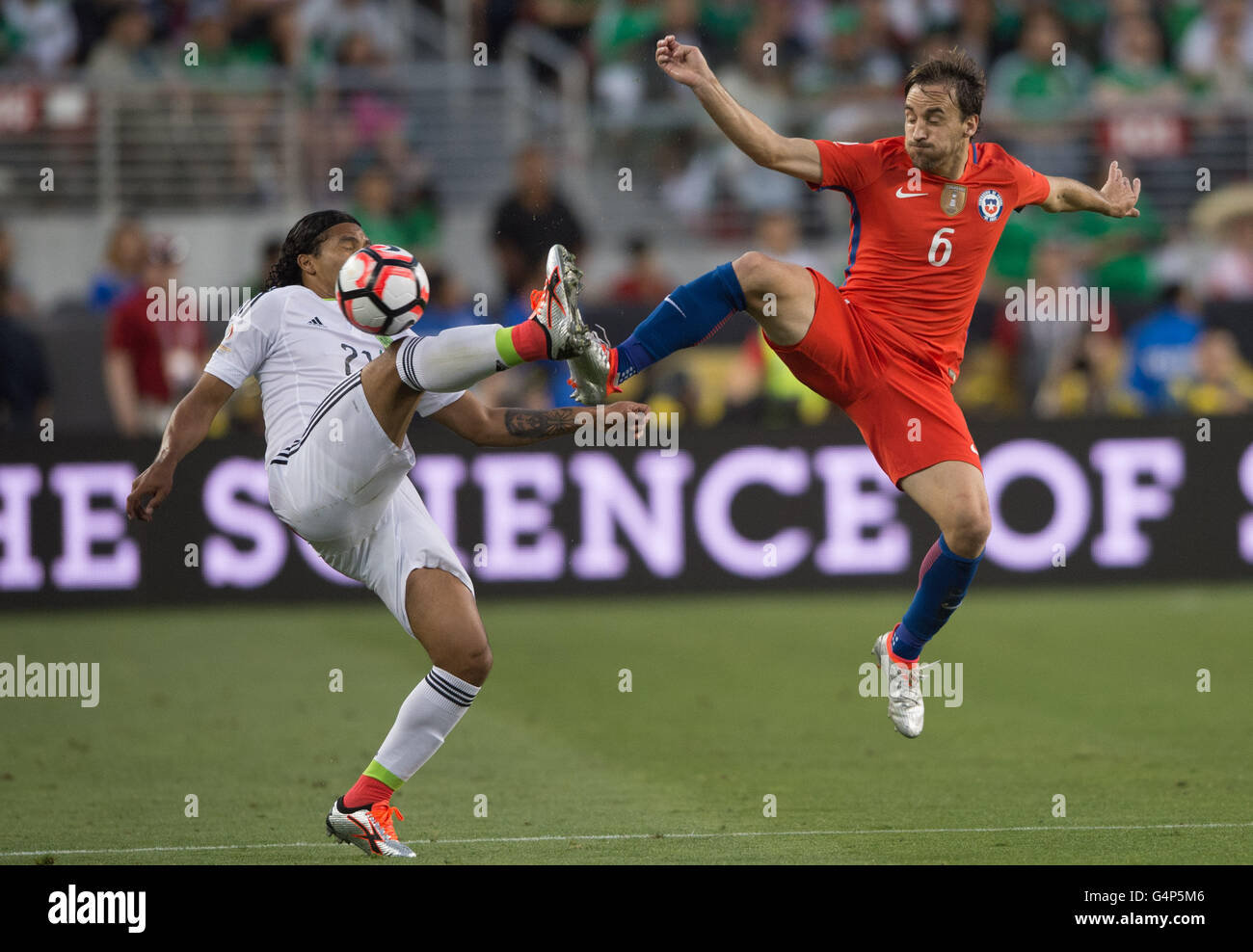 Santa Clara, USA. 18th June, 2016. Jos¨¦ Pedro Fuenzalida (R) of Chile vies with Carlos Pena of Mexico during their quarterfinal match of 2016 Copa America soccer tournament at the Levi's Stadium in Santa Clara, California, the United States, June 18, 2016. Chile won 7-0. Credit:  Yang Lei/Xinhua/Alamy Live News Stock Photo