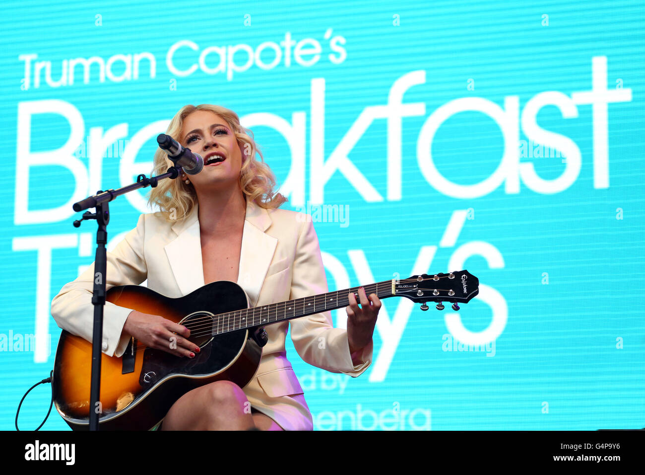London, UK. 19th June 2016. Pixie Lott performing Moon River with her guitar in Breakfast at Tiffany's at West End Live in Trafalgar Square, London Credit:  Paul Brown/Alamy Live News Stock Photo