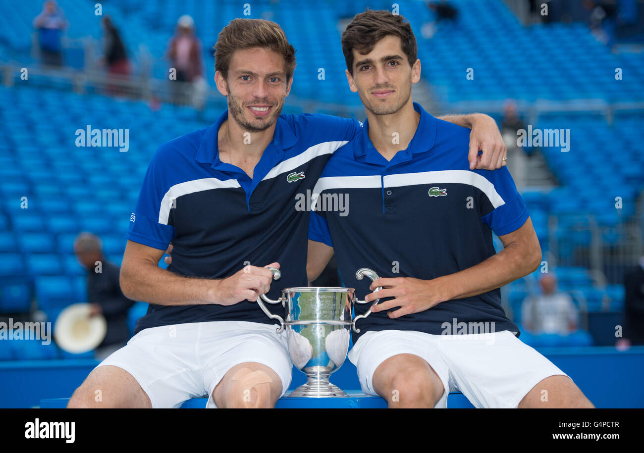 London Uk 19th June 2016 Nicolas Mahut L And Pierre Hugues Herbert Of France Lift The Men S Doubles Trophy After Victory Against Chris Guccione Of Australia And Andre Sa Of Brazil During The
