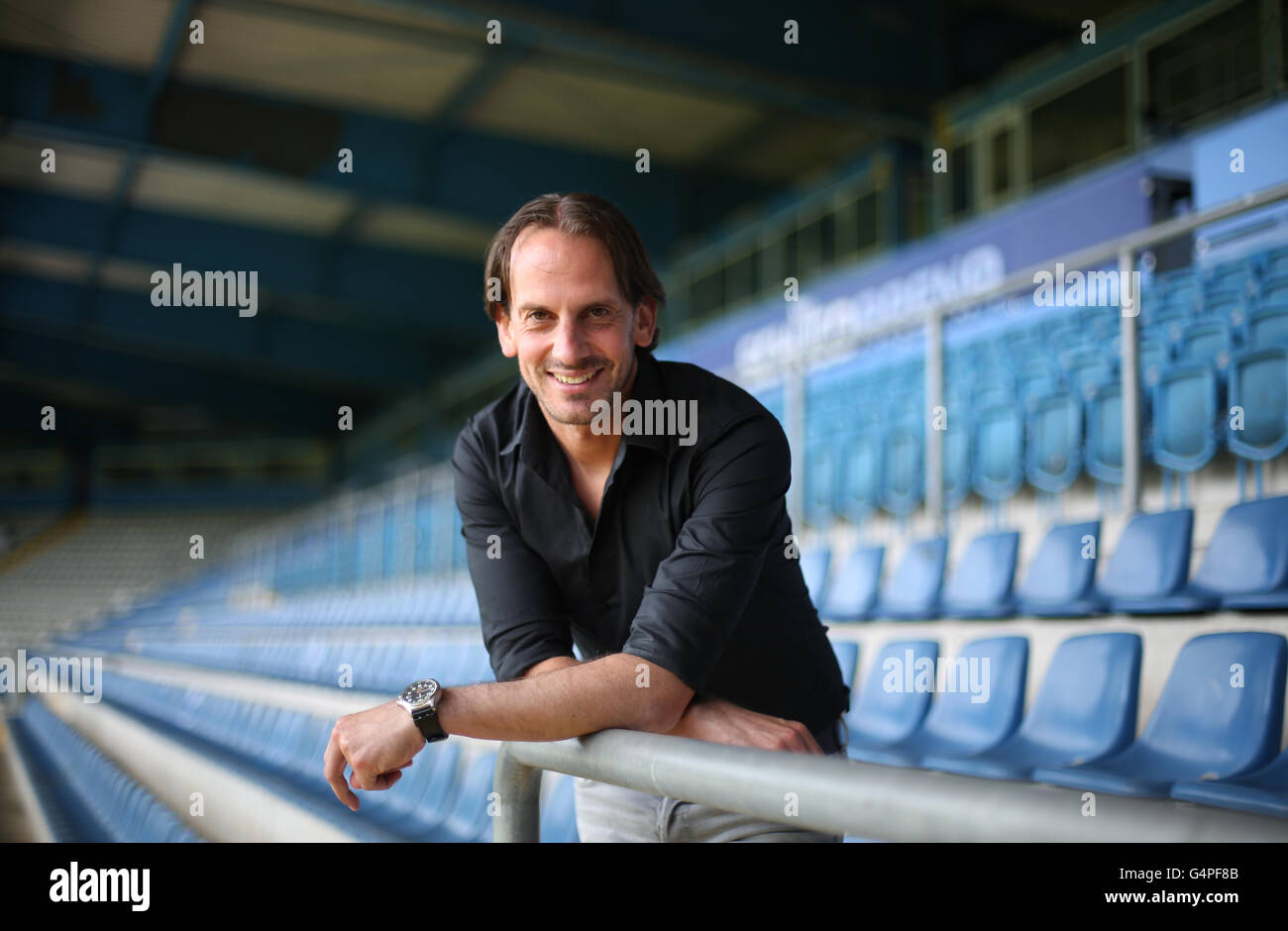 Bielefeld, Germany. 20th June, 2016. The new head coach of second soccer Bundesliga club Arminia Bielefeld, Ruediger Rehm (R), poses on the stands of Schueco Arena in Bielefeld, Germany, 20 June 2016. Photo: Ina Fassbender/dpa/Alamy Live News Stock Photo