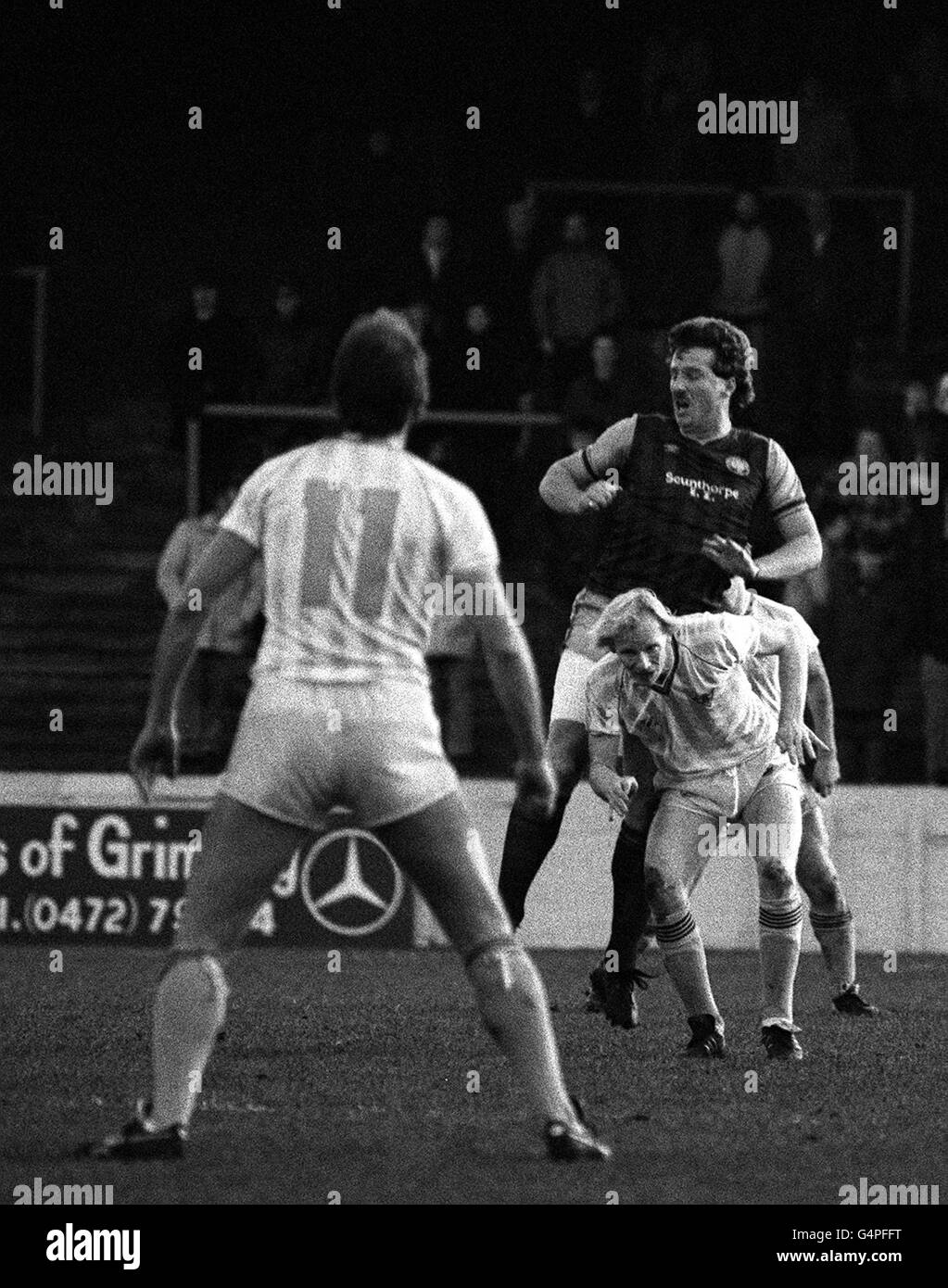 PA Photos 11/12/83 A library file picture of Ian Botham in action for Scunthorpe United in the F.A. Cup against Bury. Stock Photo