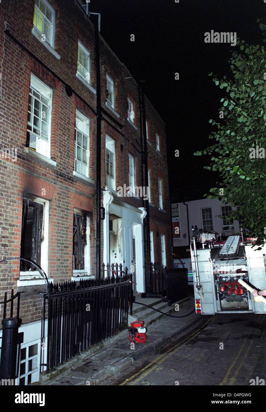 A fire engine outside the home of Roderick Jackson, the son of Upstairs, Downstairs and The Professionals actor Gordon Jackson, off Heath Street, Hampstead, north London, following a fire at home the previous day . *It emerged Thursday August 12, 1999, that Roderick, was arrested by police after the fire in which most of the ground floor was destroyed. The fire also spread to the basement and third floor. No-one was in the building when firefighters arrived, but it appeared that the fire may have been started deliberately. Stock Photo