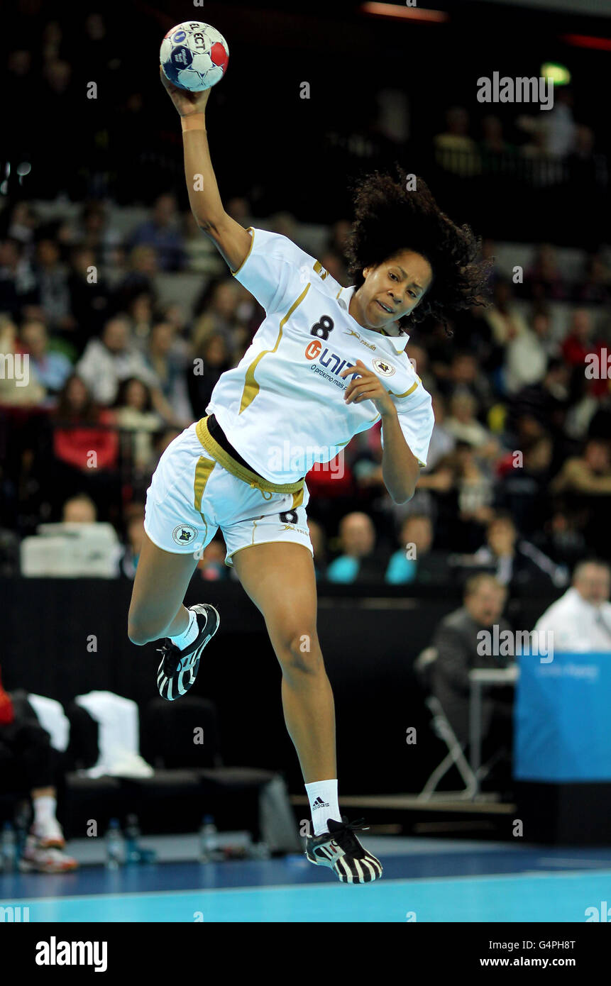 Angola's Nair Filipe Almeida scores a goal during the bronze medal match during the London Handball Cup and 2012 test event at the Olympic Park, London. Stock Photo