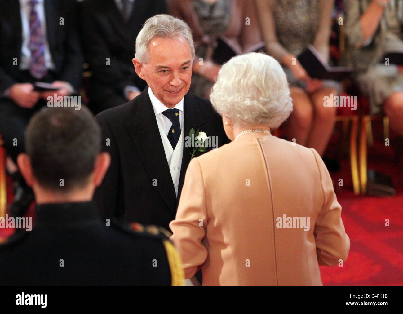 Professor Richard Davis is made an OBE by Queen Elizabeth II at Buckingham Palace, London. Stock Photo