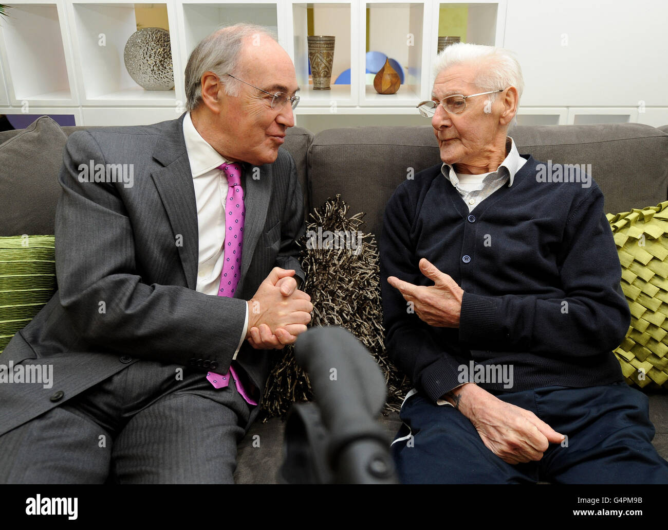 Help the Hospices Chairman, Michael Howard (left) talks to patient Mr Sidney Wilson (right) inside St Joseph's Hospice. Stock Photo
