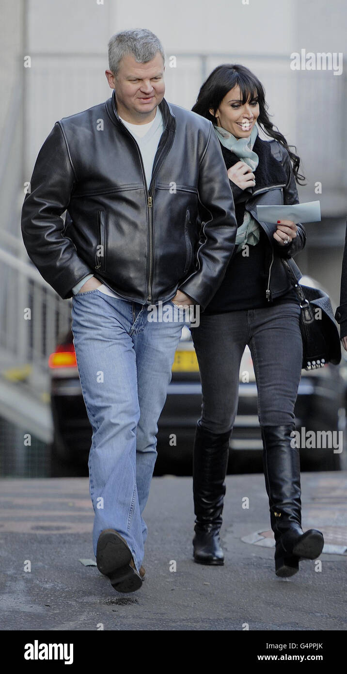 With his flies apparently undone Adrian Chiles leave the London Studios with Christine Bleakley after they presented the ITV morning show 'Daybreak' for the last time. Picture date: Monday December 5, 2011. See PA story SHOWBIZ Daybreak. Photo credit should read: Rebecca Naden/PA Wire Stock Photo
