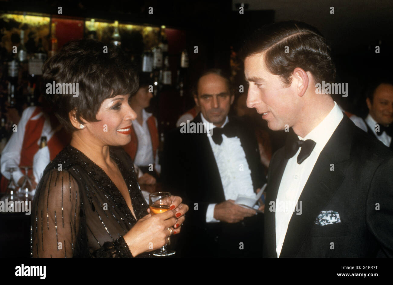 Prince Charles, who celebrates his 31st birthday today, meets singer Shirley Bassey after her performance at a gala charity concert at Wembley Conference Centre. Stock Photo