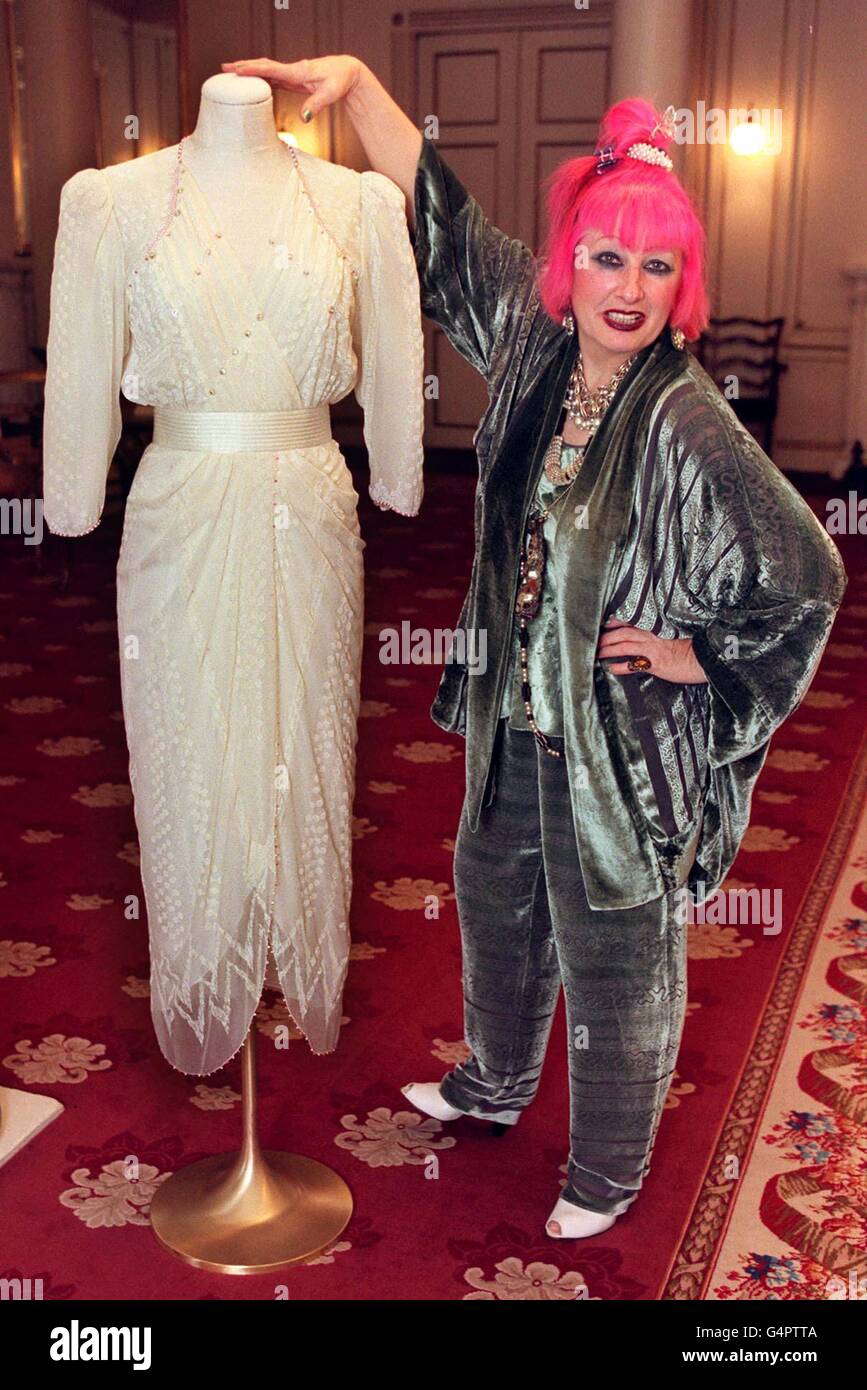 Fashion designer Zandra Rhodes, shows one of her creations made for and worn by Diana, Princess of Wales. The white gown is one of fourteen dresses owned by the late princess which are to be exhibited at her former home, Kensington Palace. * All the dresses belong to American collector Maureen Rorech-Dunkel, who bought them at a Christie's auction in 1997. 29/9/99 opens to the public on Friday October 1, 1999 Stock Photo