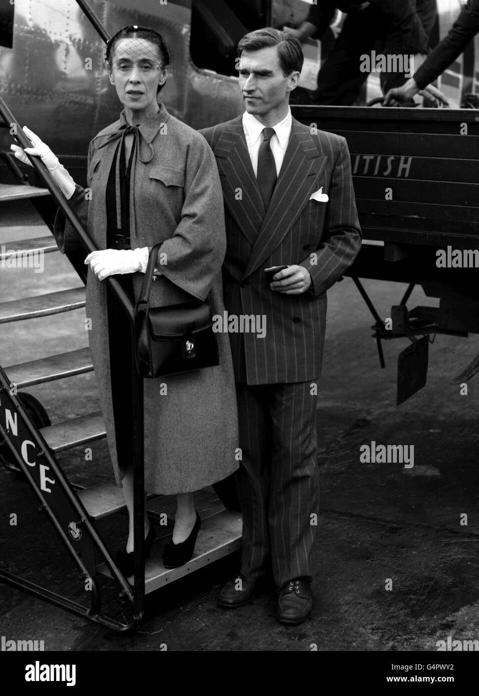 PA Photo 12/7/50 American dancer-choreographer Martha Graham with her husband Erick Hawkins arriving at London Airport by Air France liner from Paris Stock Photo