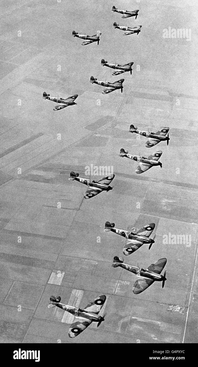 No19 Fighter Squadron, based at Duxford, Cambs., flying their two blade propeller Supermarine Spitfire aircraft in formation in the year of the outbreak of the Second World War. Stock Photo