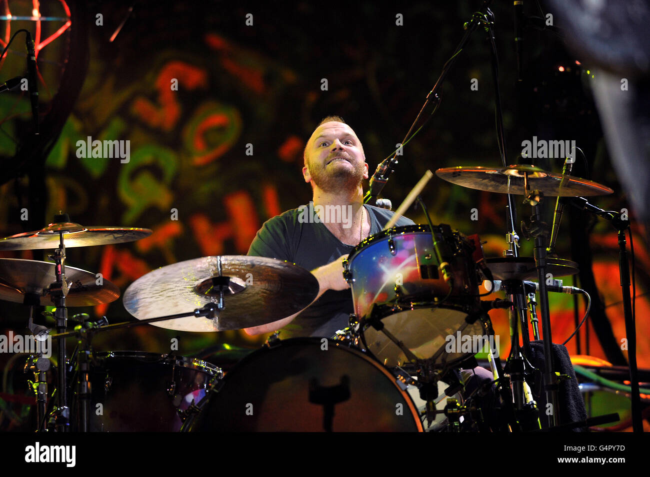 Drummer Will Champion, of Coldplay performs as they promote their fifth studio album, Mylo Xyloto, released earlier this year, at The O2 Arena, Greenwich, south London. Stock Photo