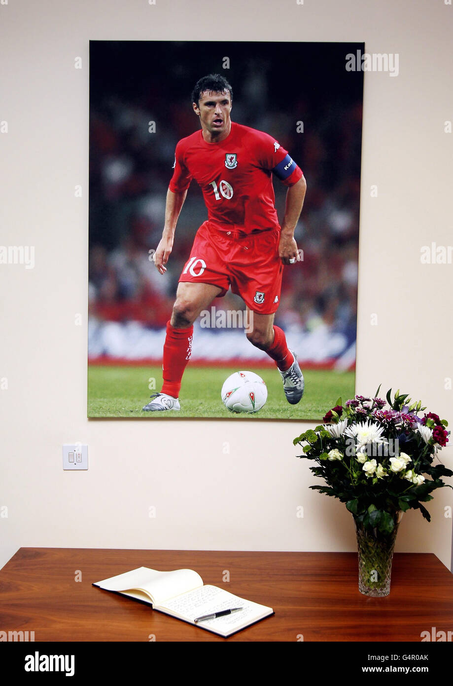 A book of rememberance for Gary Speed inside the Welsh Football Association ofiices, Cardiff. Stock Photo