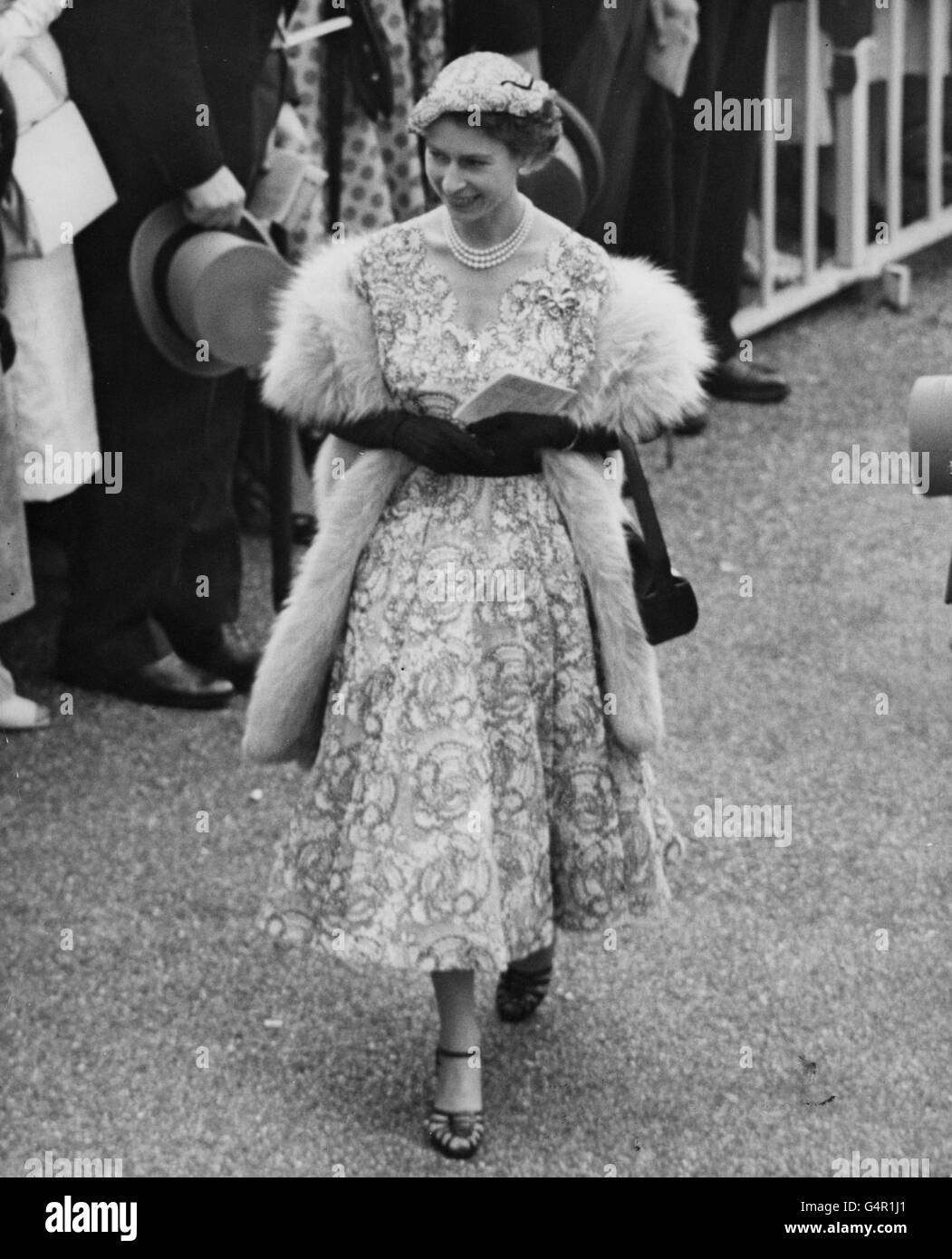 Queen Elizabeth II walks to the paddock on Gold Cup day at the Royal Ascot race meeting. Stock Photo