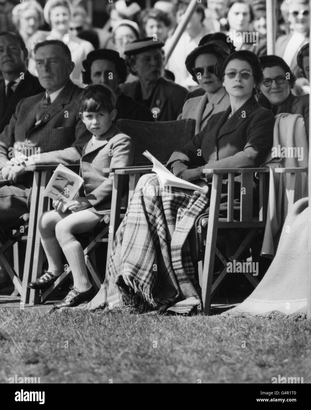 Equestrian - Windsor Horse Show - Home Park, Windsor. Queen Elizabeth II and Prince Charles watching events in the Royal Windsor Horse Show at Home Park, Windsor. Stock Photo