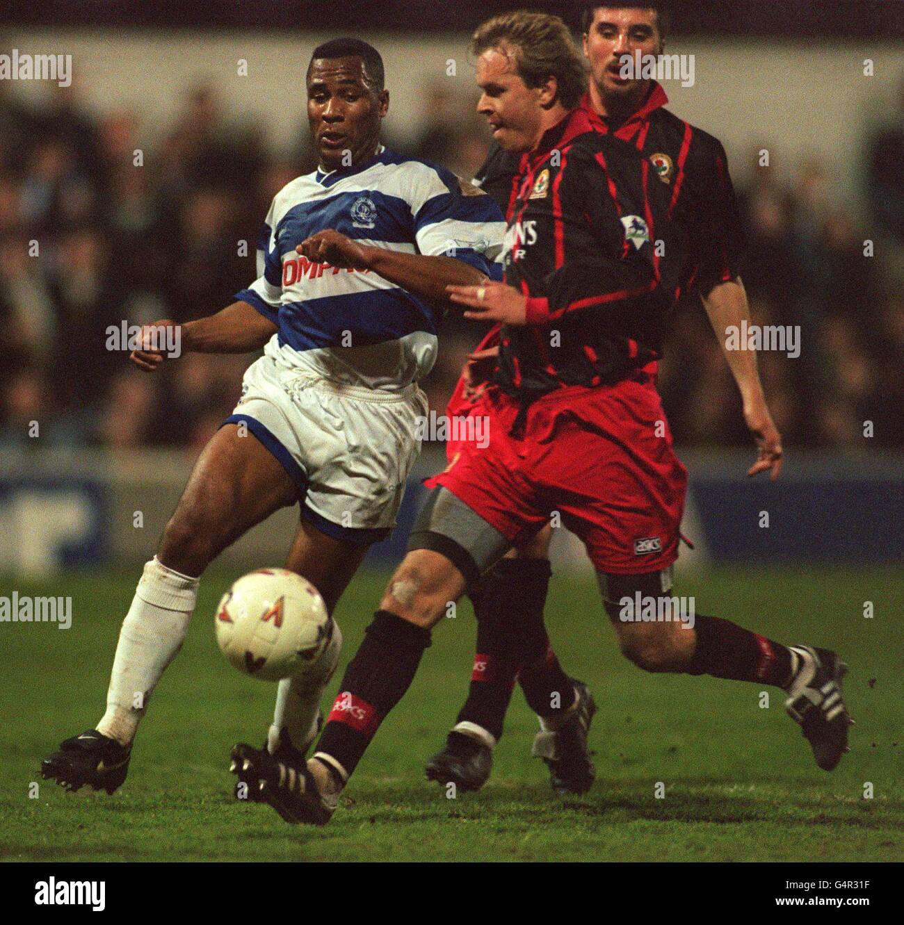 SOCCER. L-R:LES FERDINAND, (QPR) & HENNING BERG, (BR), QUEENS PARK RANGERS v BLACKBURN ROVERS ******** QPR v BR Stock Photo