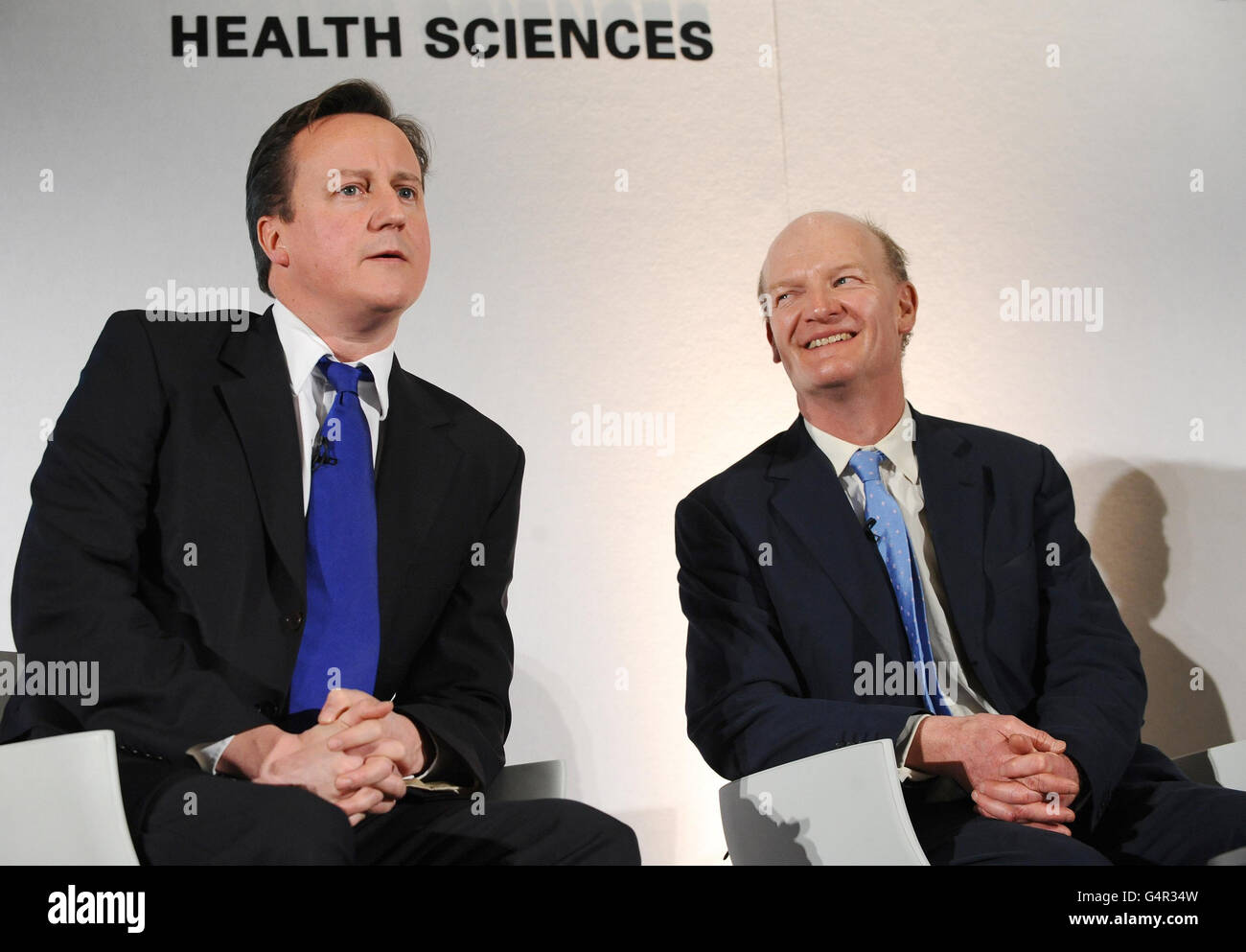 Prime Minister David Cameron (left) and Minister for Universities and Science David Willetts at the FT Global Pharmaceutical and Biotechnology Conference 2011 at the Marriott Grosvenor Square hotel in London. Stock Photo