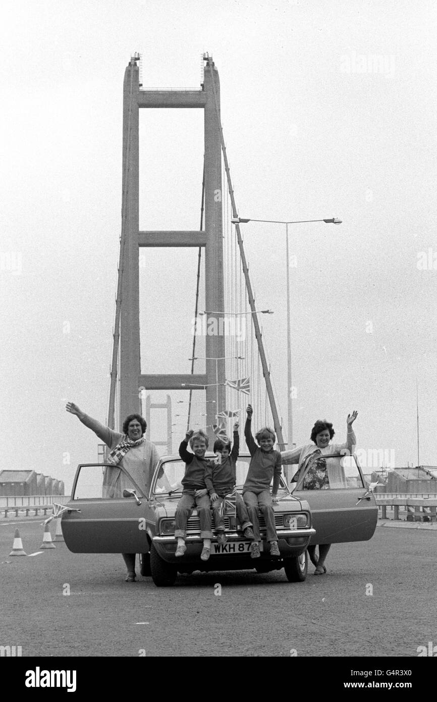 (l-r) Mrs Jennifer Hall, her children Andrew, Matthew and Richard, and the driver Mrs Christine Goodrum, all from Hull. They queued all night for the privilege of being of being first across the new Humber Bridge, which was opened on this day. The bridge would remain the world's longest bridge until 1998 with a length of 2,220 metres. Stock Photo