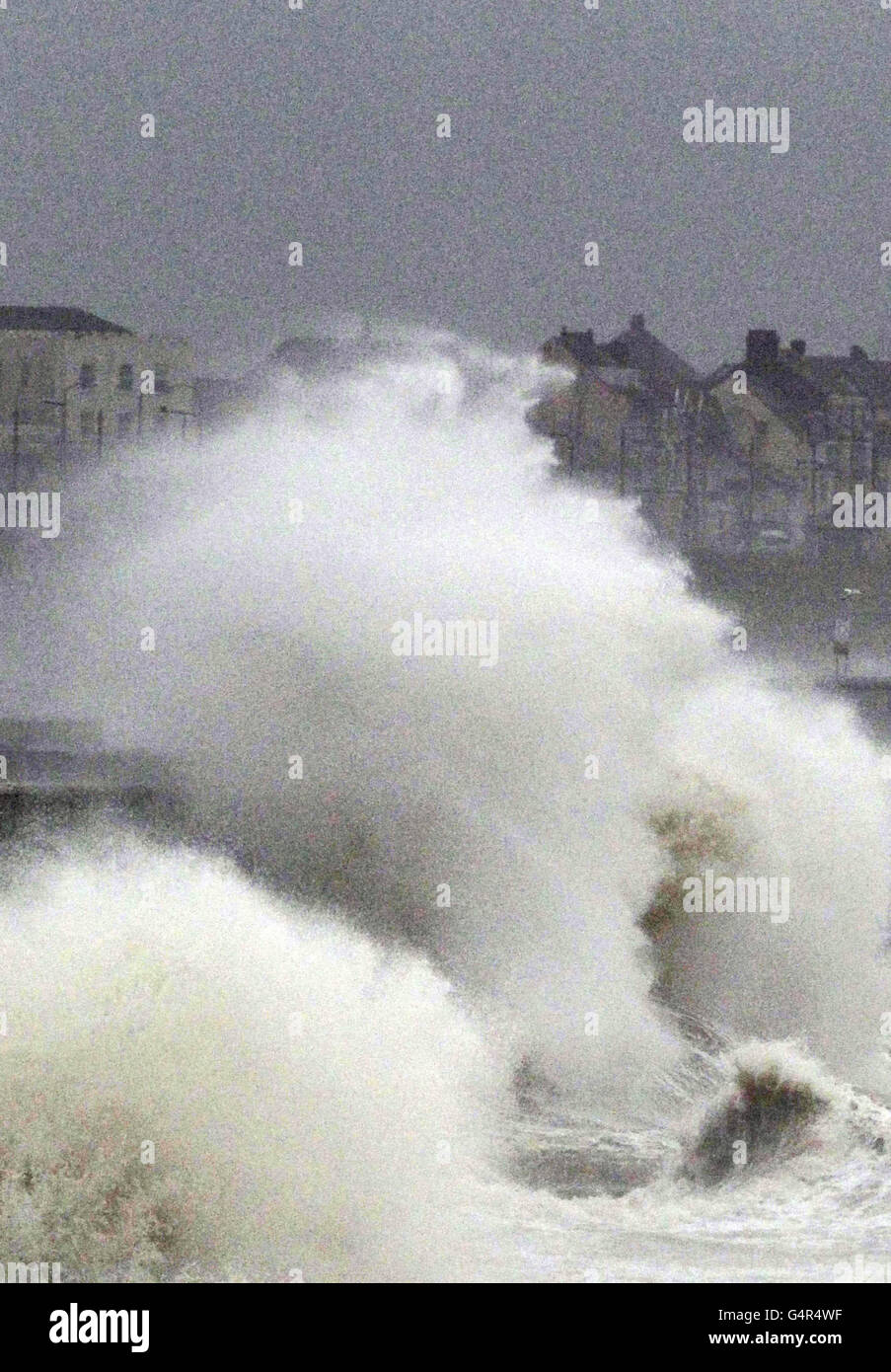 Strong winds and high waves batter the coastline at Blackpool, as Britain braces itself for winds of up to 100mph. Stock Photo