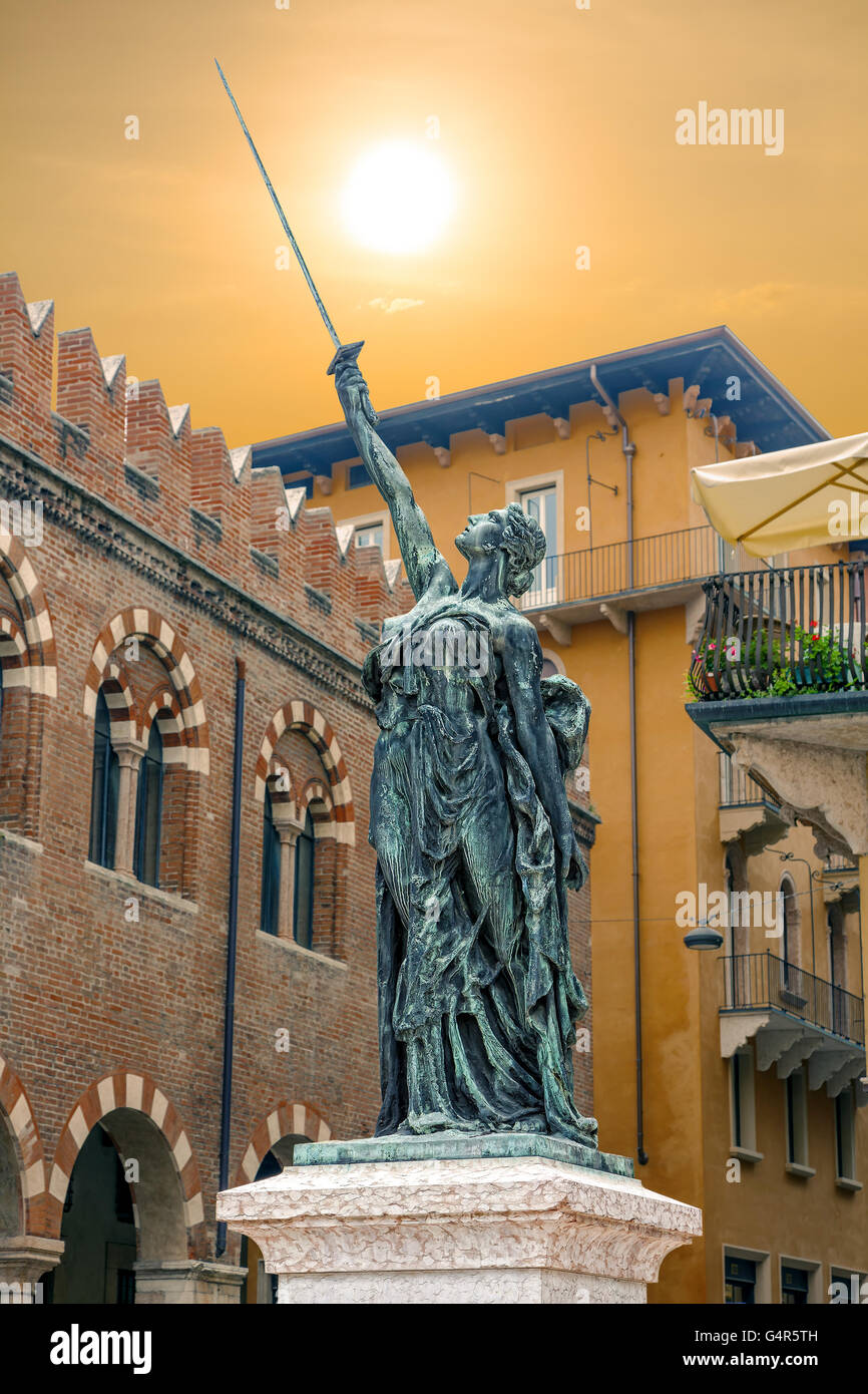 Statue of "Sword of Freedom" on the square Erbe in Verona Stock Photo