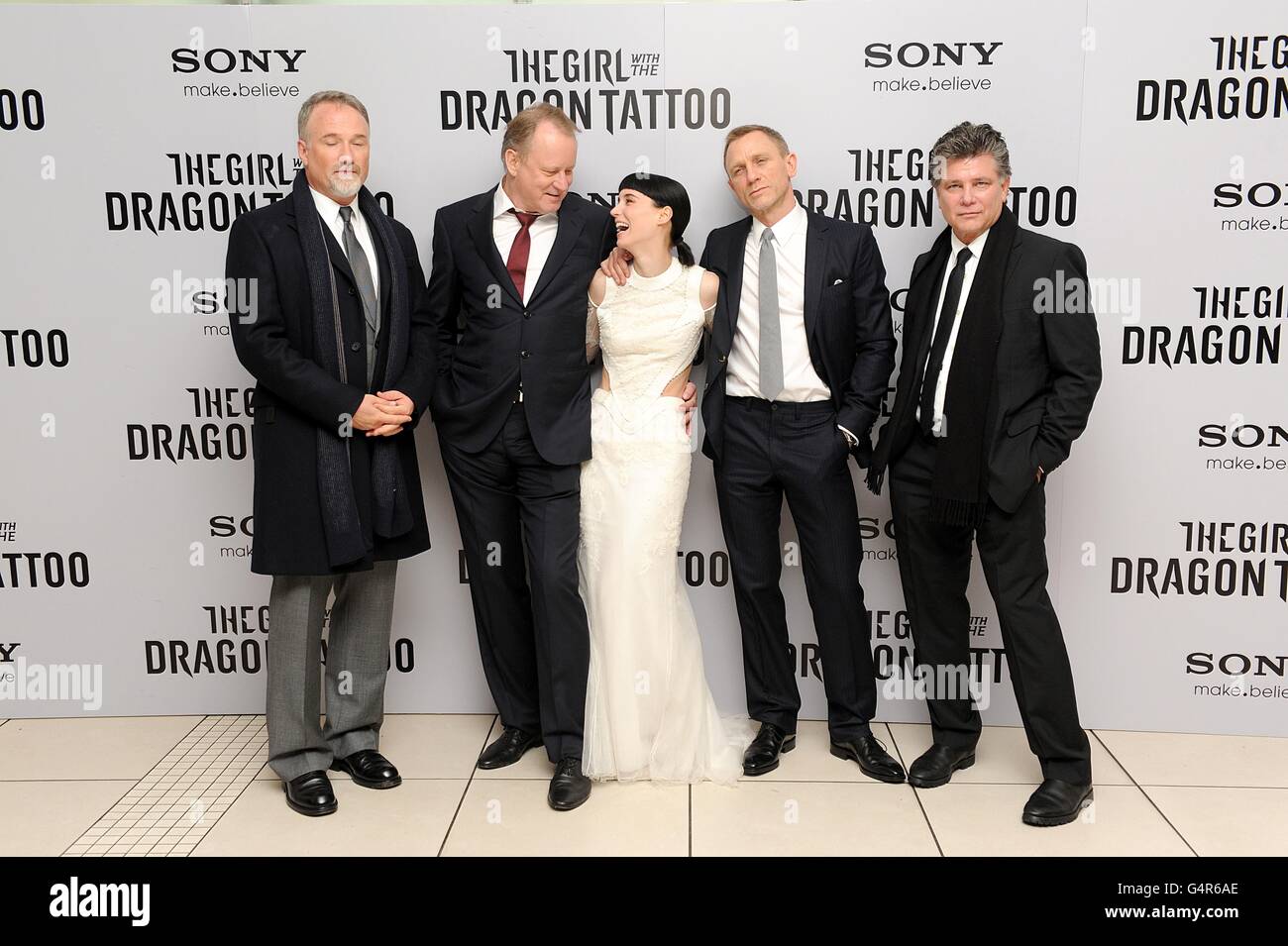 David Fincher, Stellen Skarsgard, Rooney Mara, Daniel Craig and Steven Zaillian arriving for the world premiere of The Girl with The Dragon Tattoo, at Odeon, Leicester Square, London. Stock Photo