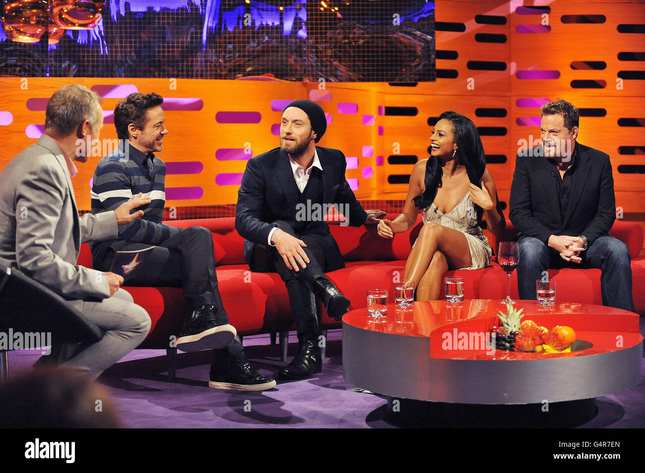 Presenter Graham Norton (left) with guests, (left to right) Robert Downey Jr, Jude Law, Alesha Dixon and Eddie Izzard, during filming of The Graham Norton Show, at The London Studios, south London, to be aired on BBC One on Friday evening. Stock Photo