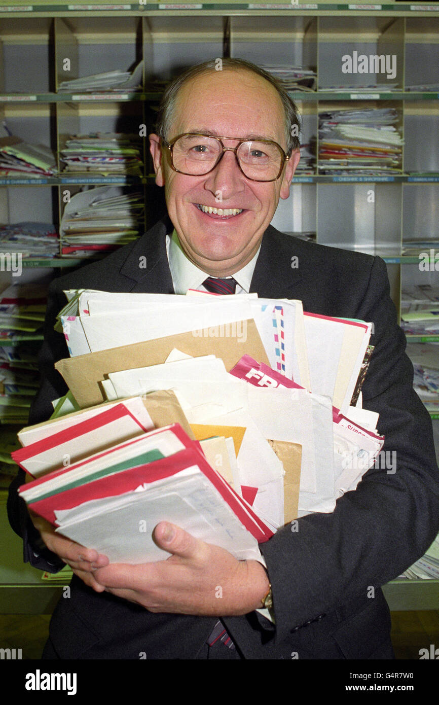 Post Office chairman Sir Bryan Nicholson with some of the Christmas mail at London's Mount
