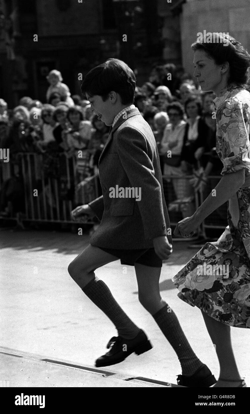 Eight year old Edward Van Cutsem marching up the steps at St Paul's Cathedral in London as he arrives to attend the rehersal for the wedding of Prince Charles and Lady Diana Spencer. Edward, the son of Mr and Mrs Hugh Van Cutsen, will be one of the page boys at the Royal Wedding. Stock Photo