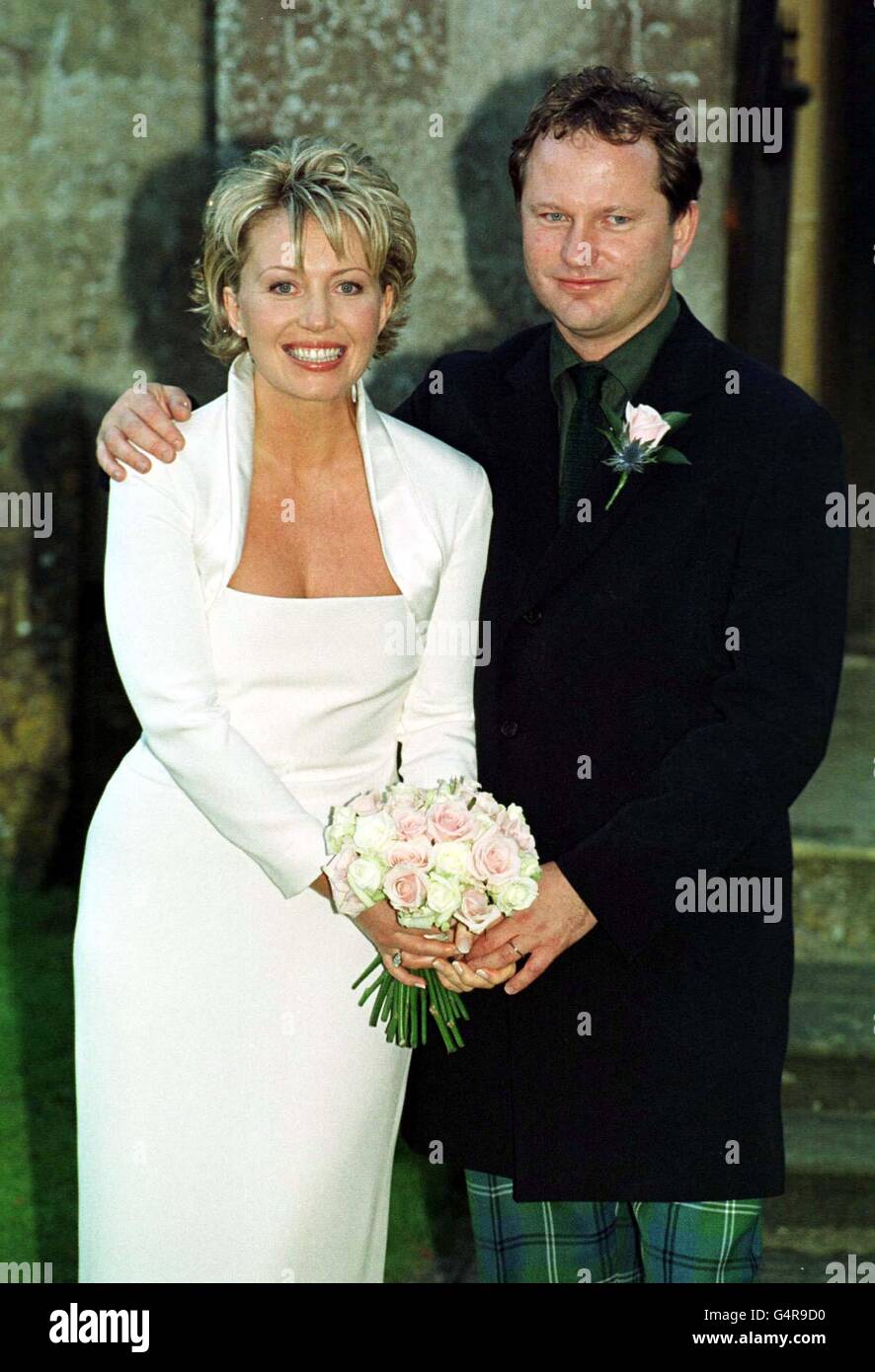 Channel 5 newsreader Kirsty Young with owner of Soho House Nick Jones after their wedding at Babington House, Somerset. * 24/7/2000 ITN lunchtime news presenter Kirsty, who is expecting her first child, said that she and her husband, millionaire hotelier Nick Jones were 'over the moon' about the baby due in early spring 2001. Stock Photo