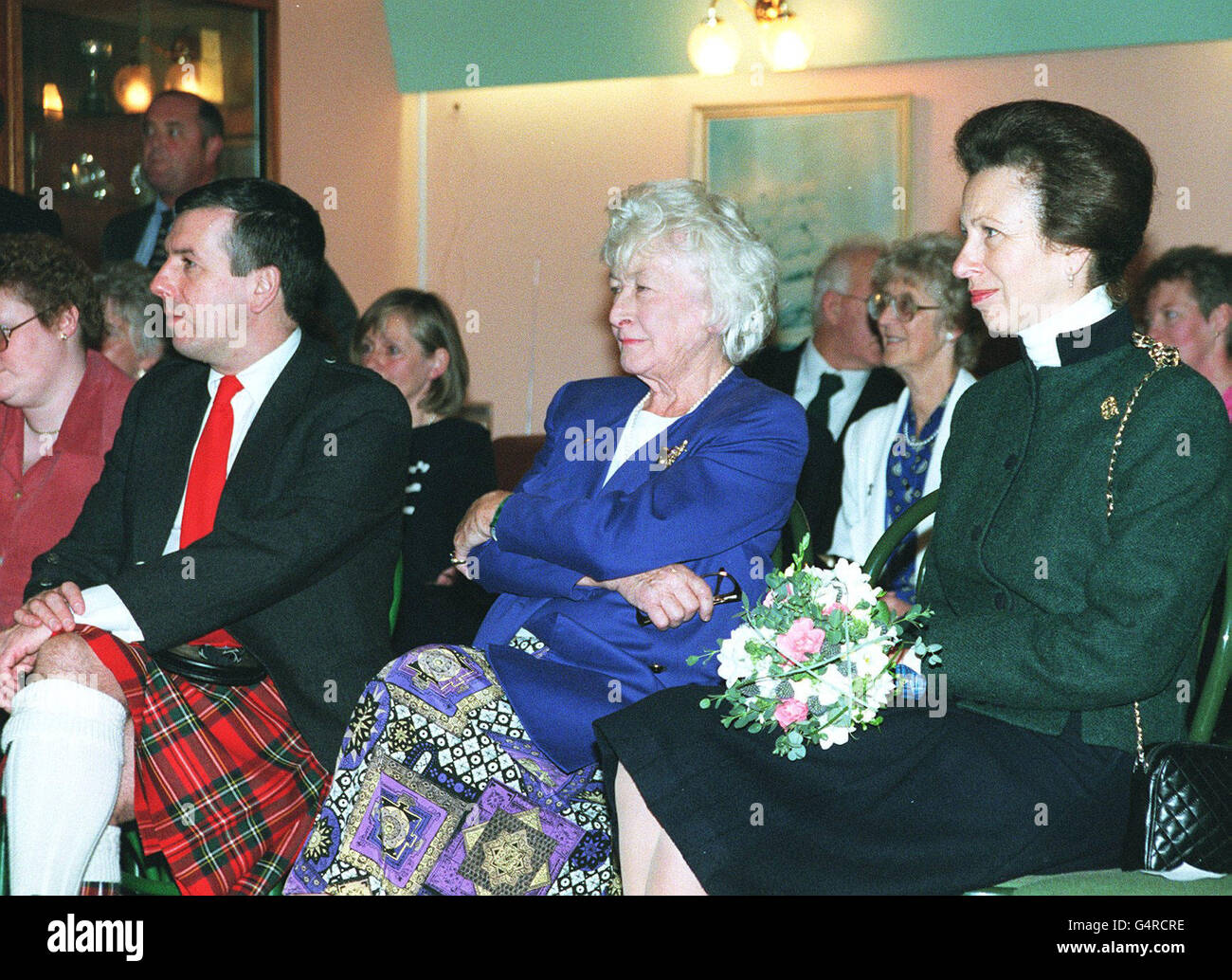 The Princess Royal with David Stewart MP (left) and MSP Winnie Ewing (centre) during a visit to Nairn Sailing Club in the north east of Scotland. Stock Photo