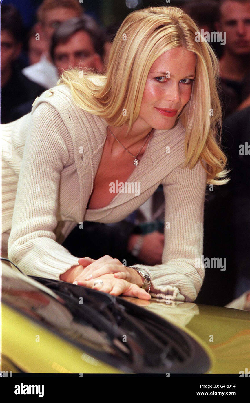 Supermodel Claudia Schiffer leaning on a citroen Xsara car during the preview day of the 1999 London Motor Show at Earls Court, London. Stock Photo