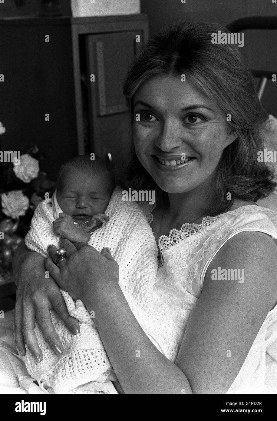 Actress Hannah Gordon at Queen Charlotte's Maternity Hospital in London with her baby son . The baby, Miss Gordons first child, was born on 19th July weighing 7lb 5oz. Miss Gordon, 28, lives with her film cameraman husband Norman Warwick in Middlesex. Stock Photo