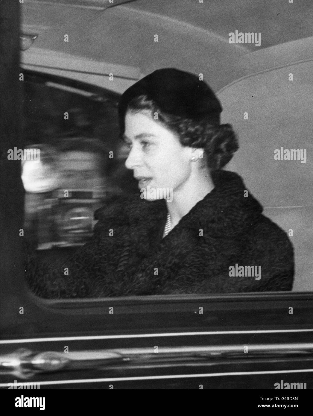 Queen Elizabeth II drives from Clarence House after the proclamation of her accession to the throne. Stock Photo