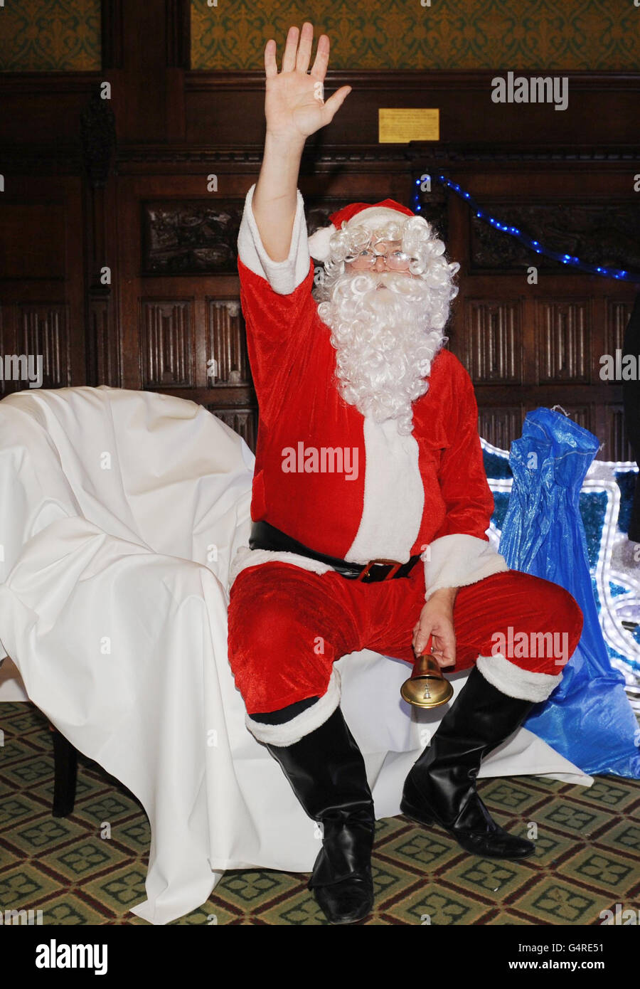 Shadow Chancellor Ed Balls dressed as Santa Claus at a Christmas party for MPs' children in the House of Commons, London. Stock Photo