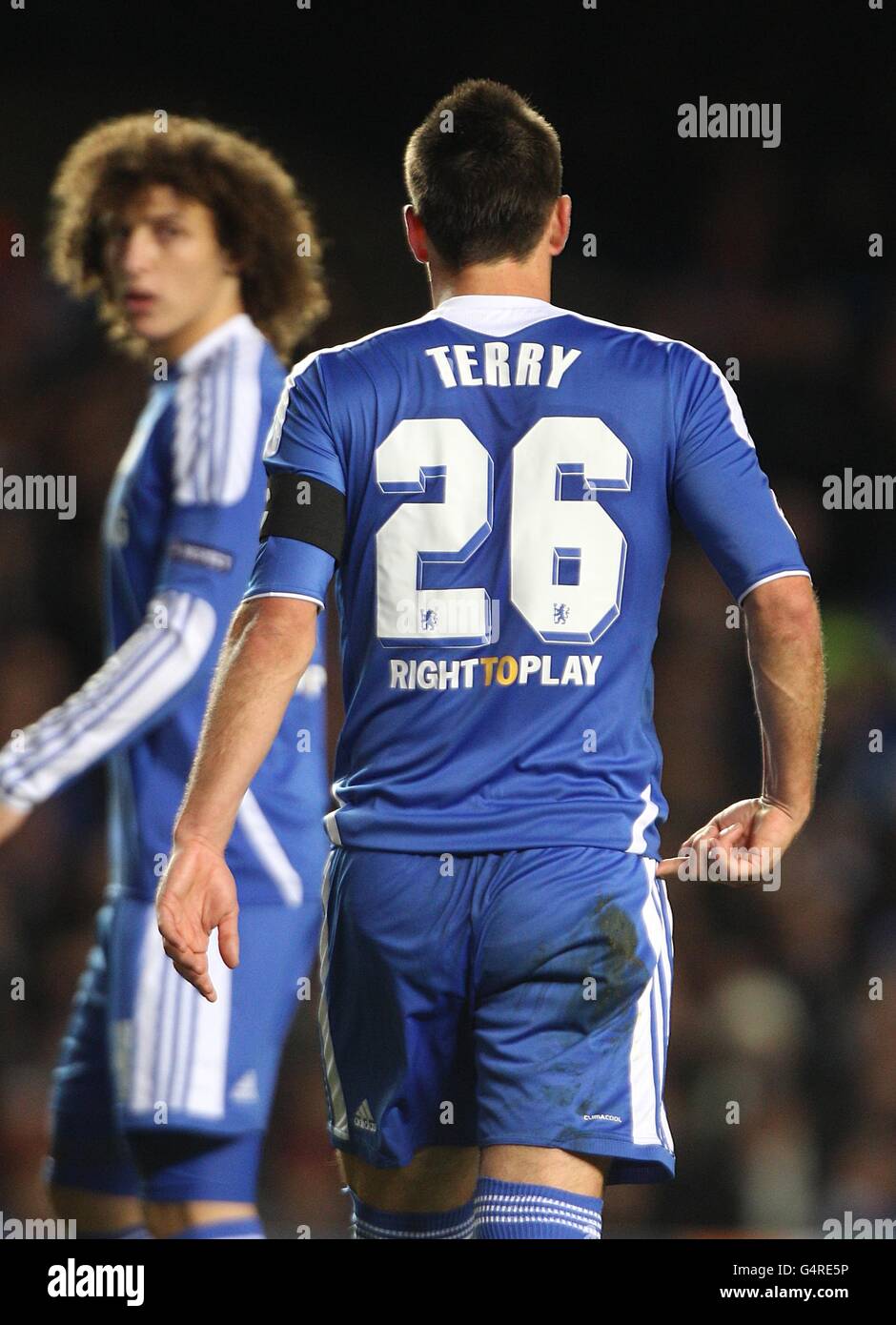 Chelsea's John Terry walks away showing the words Right To Play on his shirt Stock Photo