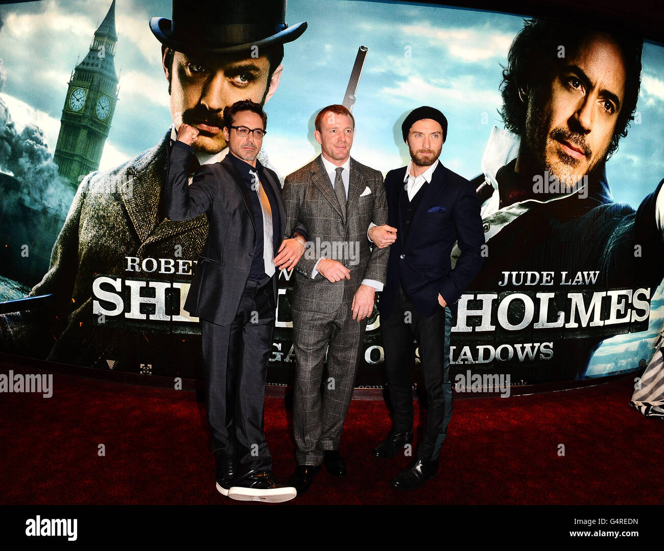 left - right) Robert Downey Jr, Guy Ritchie and Jude Law attend the  European Film Premiere of Sherlock Holmes: A Game Of Shadows at the Empire  Leicester Square, London Stock Photo - Alamy
