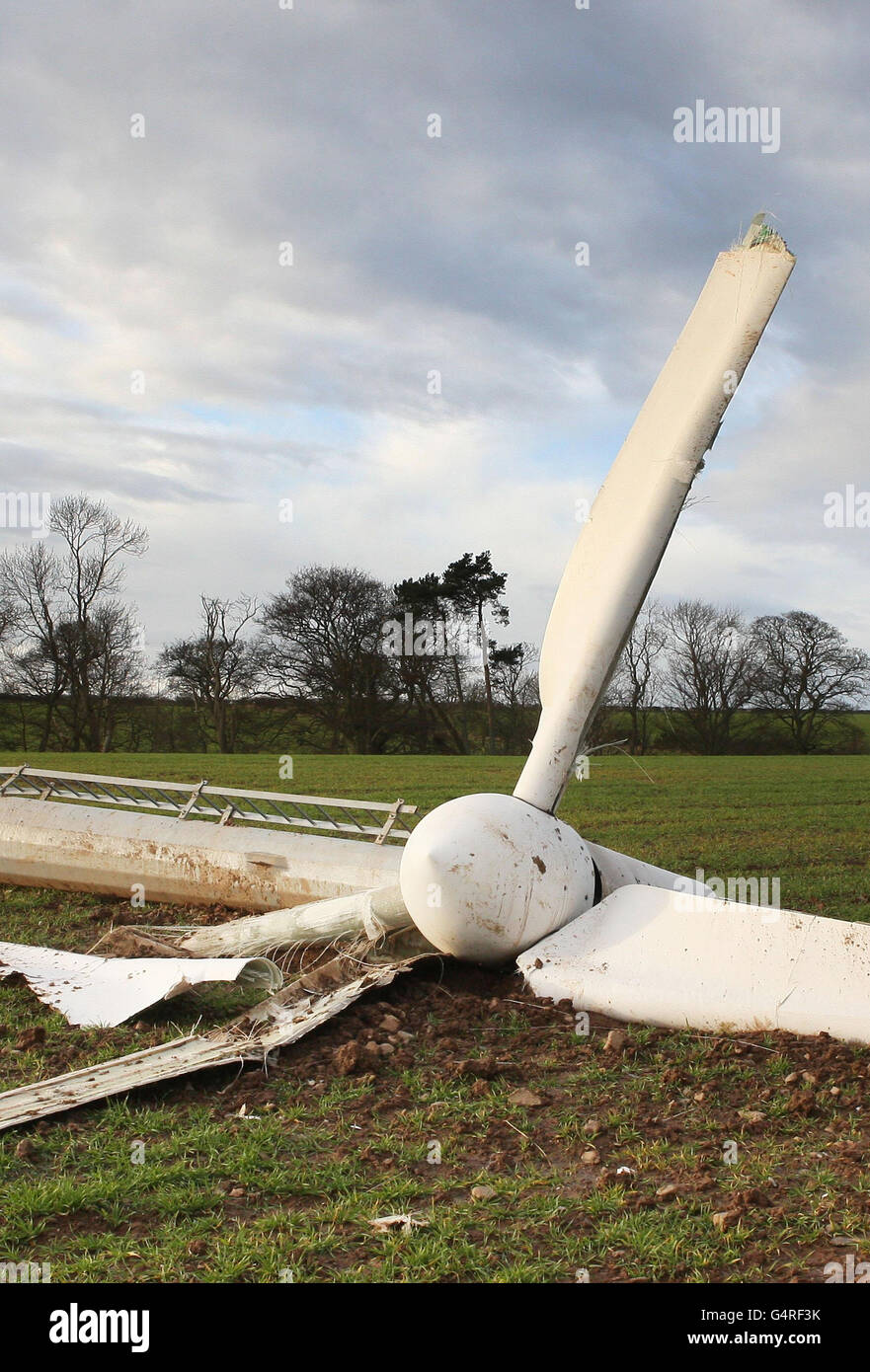 A wind turbine near Coldingham, Scotland, is seen on its side after hurricane-force winds closed schools, cut off power to tens of thousands of homes, and forced rescue missions in parts of Britain. Stock Photo